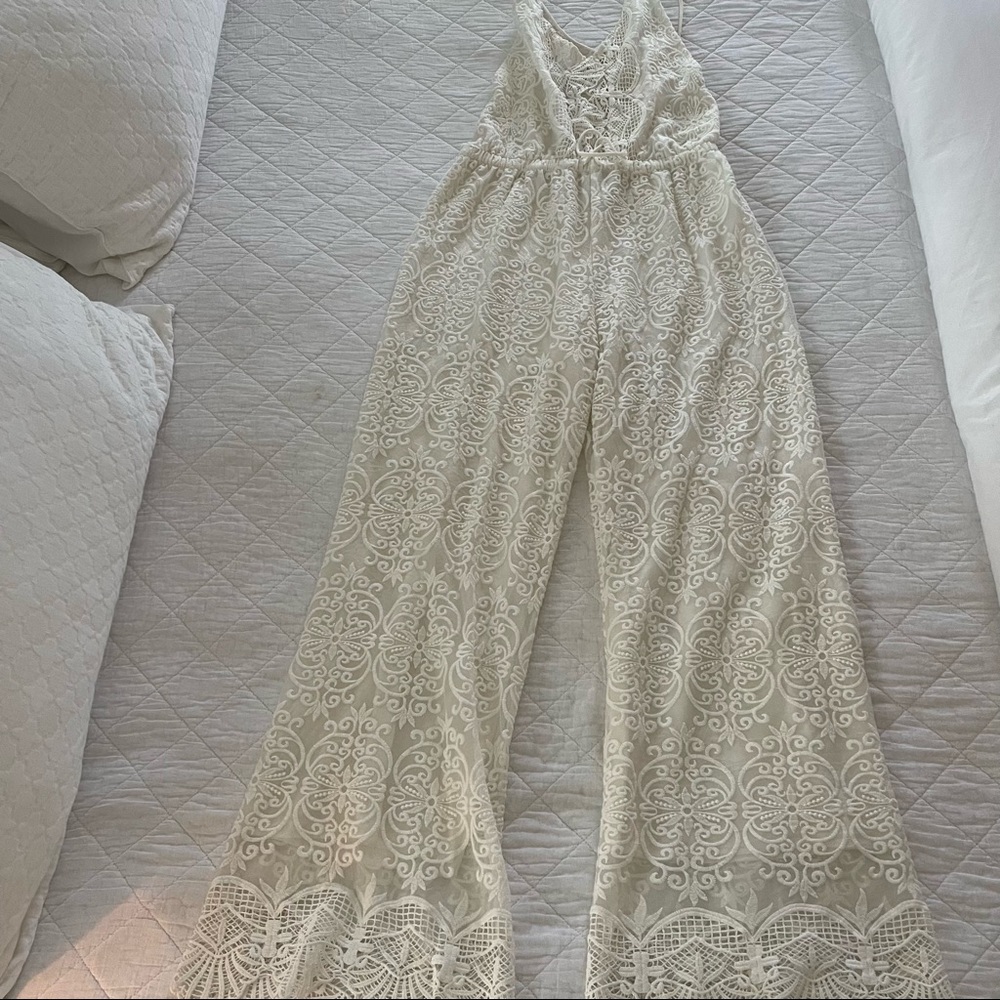 Lace Free people jumpsuit NEVER WORN.